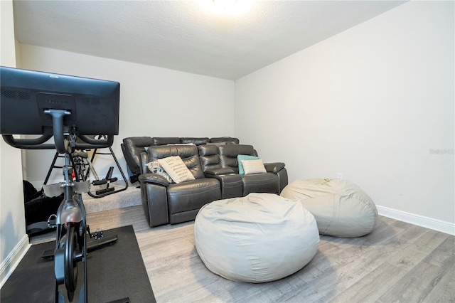 8066 Ludington Cir, Orlando, FL 32836 - workout room with wood finished floors and baseboards