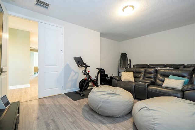 8066 Ludington Cir, Orlando, FL 32836 - living room with light wood-style flooring and baseboards