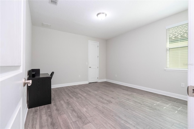 8066 Ludington Cir, Orlando, FL 32836 - unfurnished office with wood finished floors and baseboards