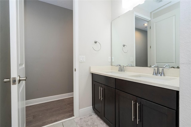 8066 Ludington Cir, Orlando, FL 32836 - bathroom with double vanity and tile patterned flooring