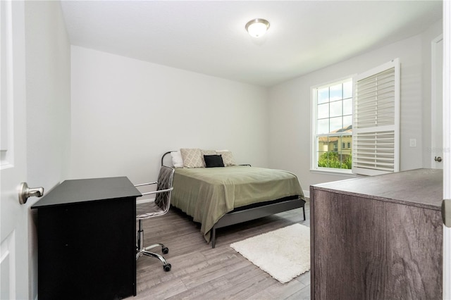 8066 Ludington Cir, Orlando, FL 32836 - bedroom featuring wood finished floors