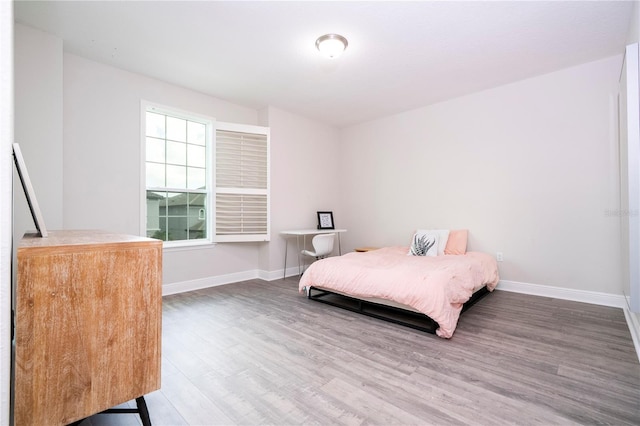 8066 Ludington Cir, Orlando, FL 32836 - bedroom with wood finished floors and baseboards