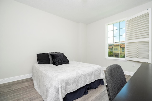 8066 Ludington Cir, Orlando, FL 32836 - bedroom with wood finished floors and baseboards
