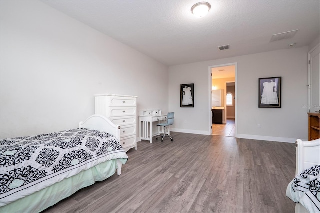 8066 Ludington Cir, Orlando, FL 32836 - bedroom with wood finished floors and baseboards