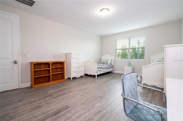 8066 Ludington Cir, Orlando, FL 32836 - bedroom featuring wood finished floors and baseboards