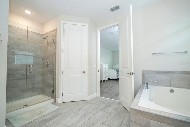 8066 Ludington Cir, Orlando, FL 32836 - ensuite bathroom with a stall shower and a garden tub