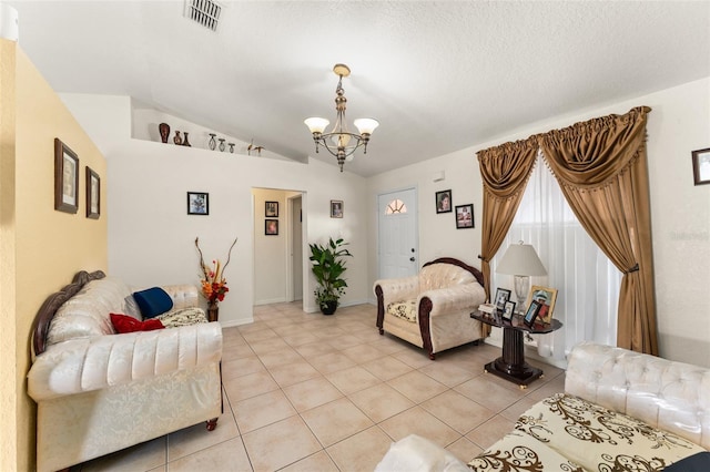 470 Cardinal Ct, Kissimmee, FL 34759 - living room with a chandelier, light tile patterned floors, and lofted ceiling