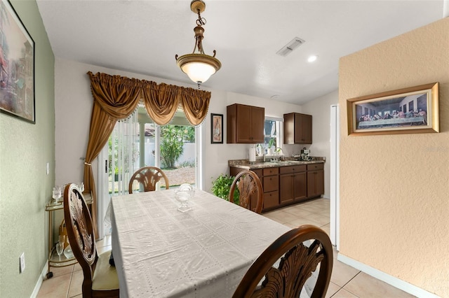 470 Cardinal Ct, Kissimmee, FL 34759 - dining space featuring a textured wall and light tile patterned flooring