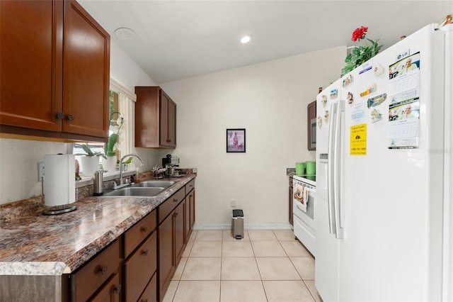 470 Cardinal Ct, Kissimmee, FL 34759 - kitchen featuring white appliances, light tile patterned floors, and recessed lighting