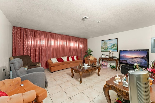 470 Cardinal Ct, Kissimmee, FL 34759 - living room with light tile patterned floors and a textured ceiling