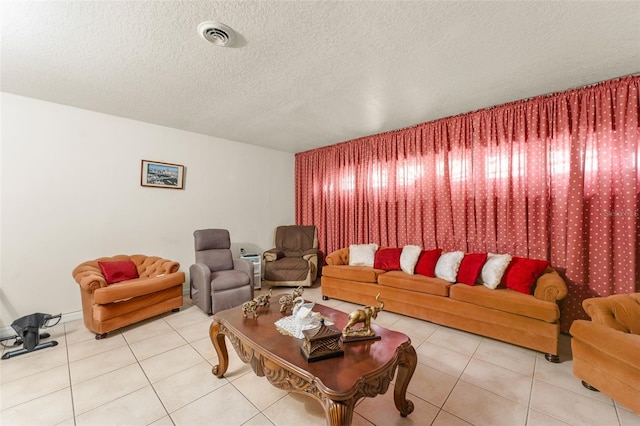 470 Cardinal Ct, Kissimmee, FL 34759 - living area featuring tile patterned floors and a textured ceiling