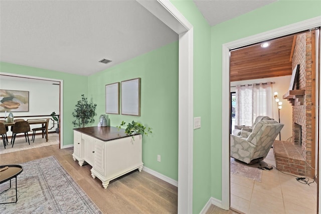 473 Burnt Tree Ln, Apopka, FL 32712 - office featuring light wood finished floors and a fireplace