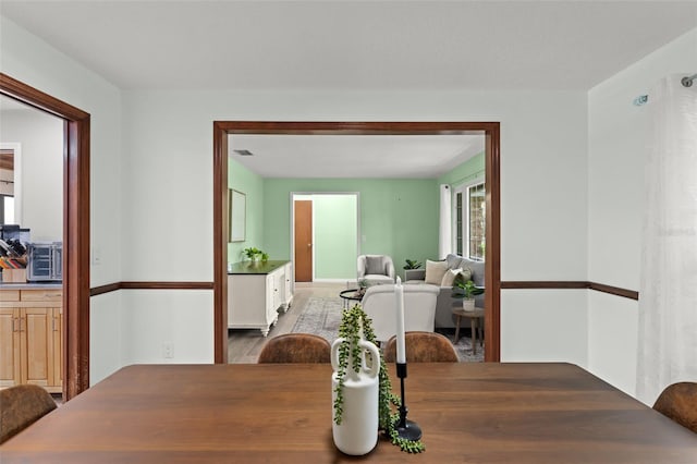 473 Burnt Tree Ln, Apopka, FL 32712 - dining area featuring wood finished floors