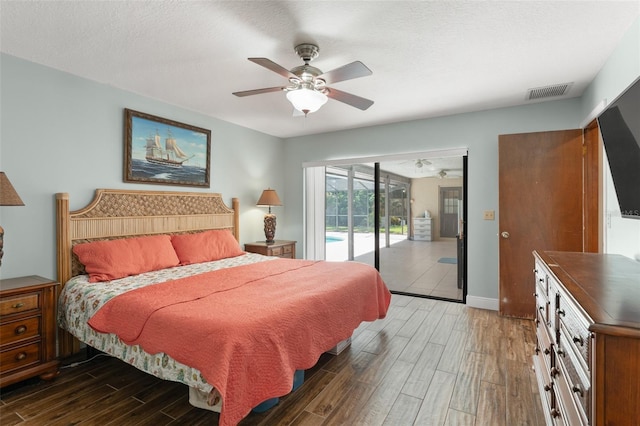 473 Burnt Tree Ln, Apopka, FL 32712 - bedroom featuring access to exterior, wood finished floors, and ceiling fan