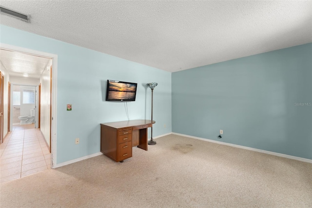 473 Burnt Tree Ln, Apopka, FL 32712 - unfurnished bedroom with a textured ceiling and light carpet