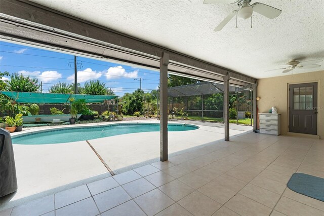 473 Burnt Tree Ln, Apopka, FL 32712 - view of swimming pool featuring ceiling fan, a patio area, and glass enclosure