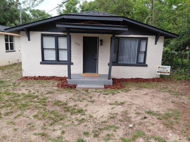 2107 Hollywood Ave, Eustis, FL 32726 - bungalow-style home featuring brick siding