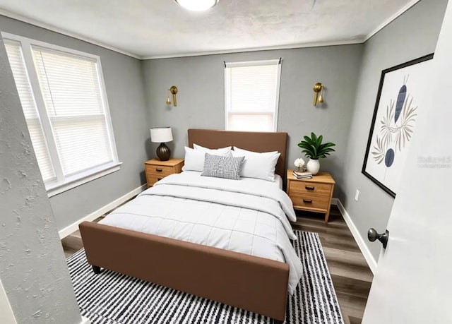 2107 Hollywood Ave, Eustis, FL 32726 - bedroom featuring wood finished floors, multiple windows, and ornamental molding