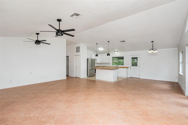 4085 Cypress Bnd, Geneva, FL 32732 - unfurnished living room featuring vaulted ceiling and ceiling fan