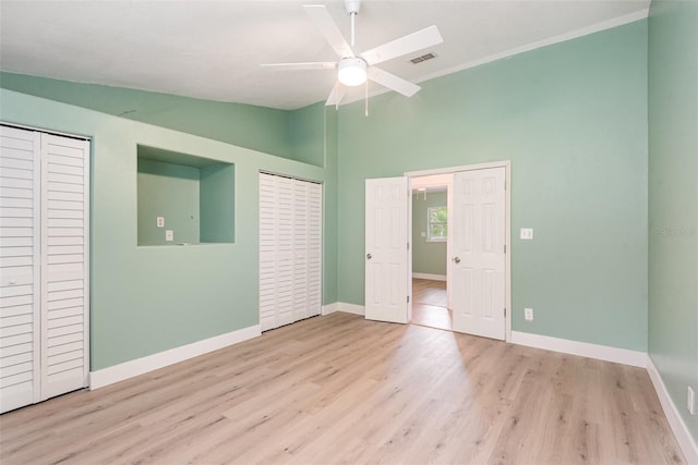 4085 Cypress Bnd, Geneva, FL 32732 - unfurnished bedroom featuring wood finished floors, a ceiling fan, and high vaulted ceiling