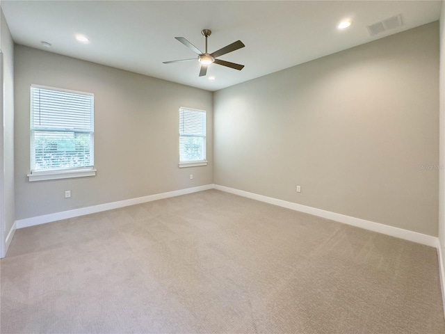 16210 Ravenna Ct, Montverde, FL 34756 - empty room featuring a ceiling fan, light colored carpet, and recessed lighting