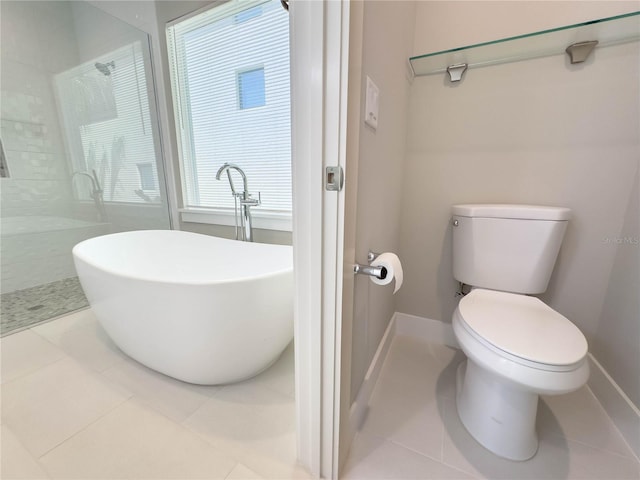 16210 Ravenna Ct, Montverde, FL 34756 - bathroom with a freestanding tub, tiled shower, and tile patterned flooring