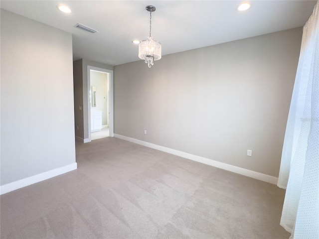 16210 Ravenna Ct, Montverde, FL 34756 - empty room with light colored carpet, recessed lighting, and a chandelier