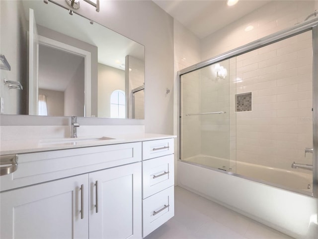 16210 Ravenna Ct, Montverde, FL 34756 - full bathroom with vanity, bath / shower combo with glass door, and tile patterned floors