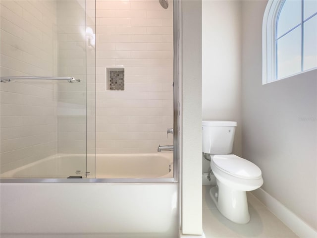 16210 Ravenna Ct, Montverde, FL 34756 - full bathroom featuring toilet and shower / bath combination with glass door