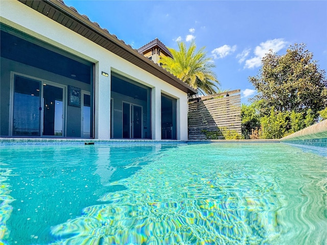 16210 Ravenna Ct, Montverde, FL 34756 - outdoor pool featuring a sunroom