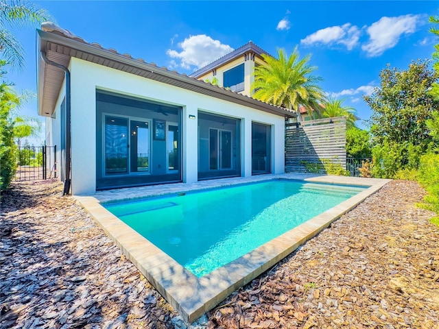 16210 Ravenna Ct, Montverde, FL 34756 - back of property featuring stucco siding and a tiled roof