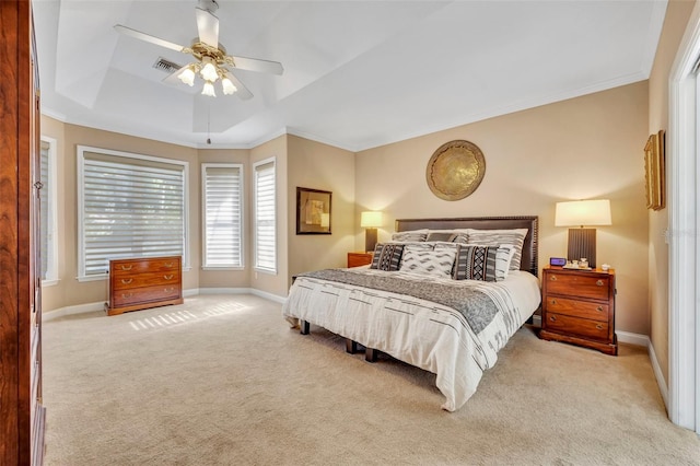 413 Harbour Oaks Pointe Dr, Edgewood, FL 32809 - bedroom with a raised ceiling, light carpet, crown molding, and a ceiling fan