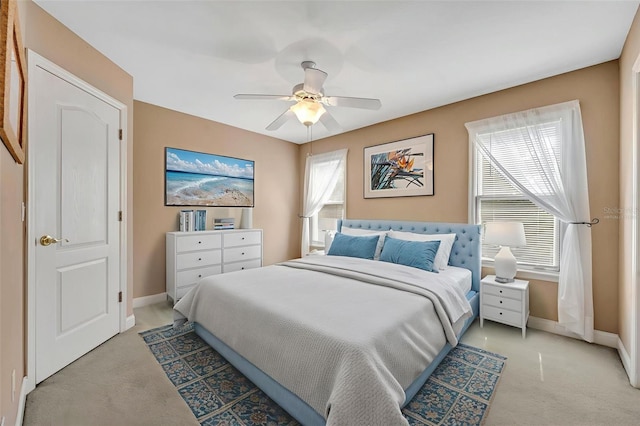 413 Harbour Oaks Pointe Dr, Edgewood, FL 32809 - bedroom featuring light carpet and ceiling fan