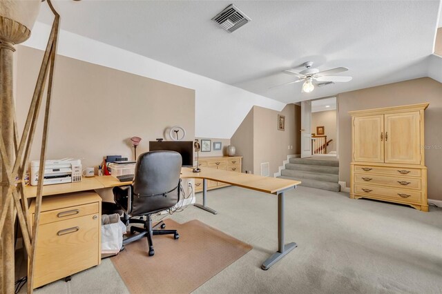 413 Harbour Oaks Pointe Dr, Edgewood, FL 32809 - home office with a ceiling fan, light carpet, and lofted ceiling
