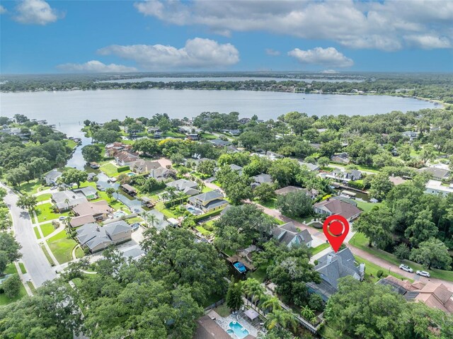 413 Harbour Oaks Pointe Dr, Edgewood, FL 32809 - aerial view of property and surrounding area featuring a large body of water and nearby suburban area