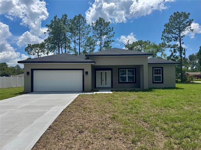 7215 N Westbrook Way, Citrus Springs, FL 34433 - view of front of house with stucco siding, french doors, an attached garage, and concrete driveway