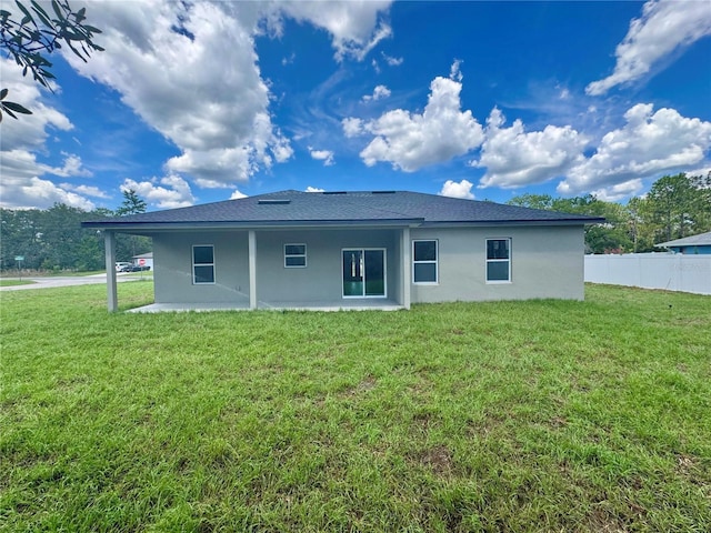 7215 N Westbrook Way, Citrus Springs, FL 34433 - back of house featuring stucco siding and a patio area