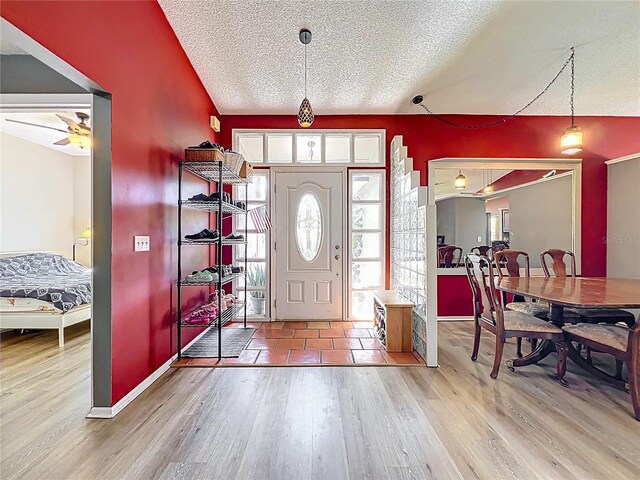 1044 Dees Dr, Oviedo, FL 32765 - entrance foyer featuring wood finished floors, a textured ceiling, and ceiling fan