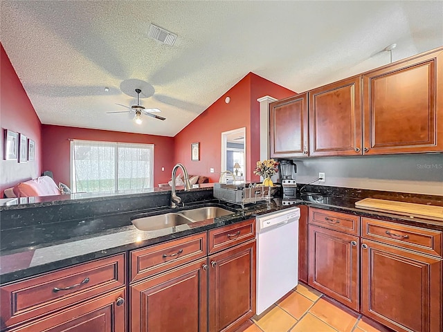 1044 Dees Dr, Oviedo, FL 32765 - kitchen with white dishwasher, open floor plan, a ceiling fan, a textured ceiling, and vaulted ceiling
