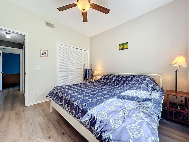 1044 Dees Dr, Oviedo, FL 32765 - bedroom featuring wood finished floors, a closet, and ceiling fan