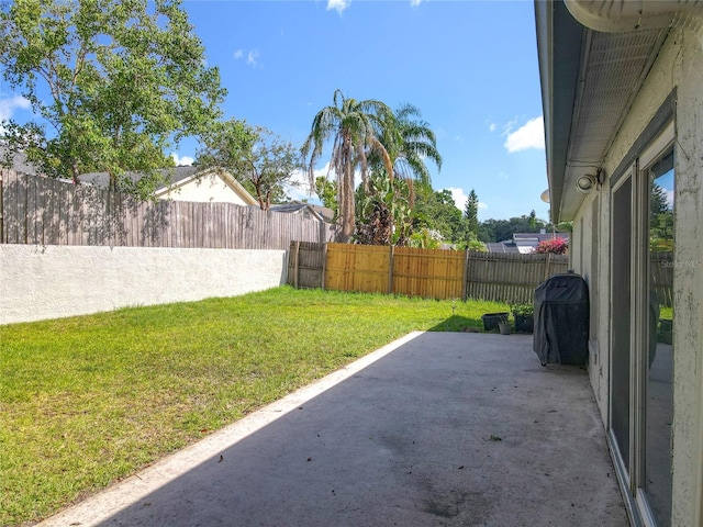 1044 Dees Dr, Oviedo, FL 32765 - fenced backyard with a patio area