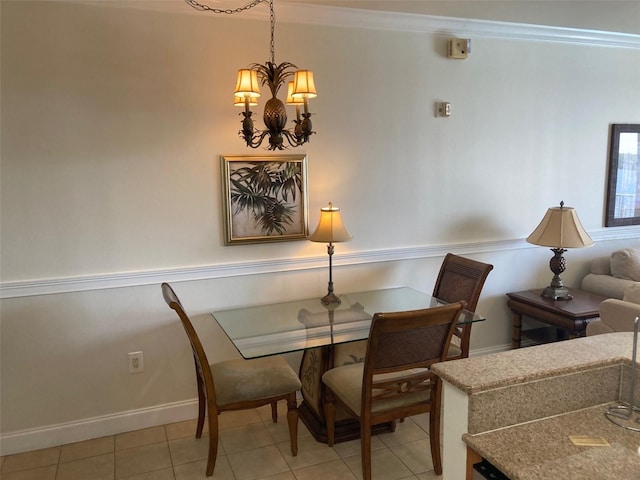 13415 Blue Heron Bch Unit 203, Orlando, FL 32821 - dining room with a chandelier, light tile patterned floors, and crown molding