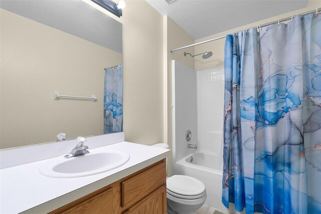 1113 Canopy Oaks Dr, Minneola, FL 34715 - full bathroom with vanity, shower / bath combo with shower curtain, and a textured ceiling
