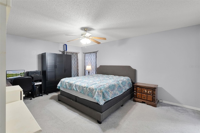 1113 Canopy Oaks Dr, Minneola, FL 34715 - bedroom featuring light colored carpet, an office area, a ceiling fan, and a textured ceiling