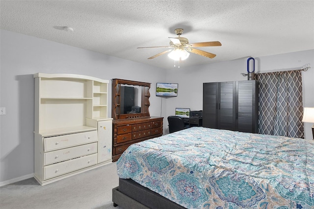 1113 Canopy Oaks Dr, Minneola, FL 34715 - bedroom featuring carpet floors, a ceiling fan, and a textured ceiling