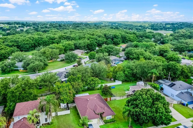 1113 Canopy Oaks Dr, Minneola, FL 34715 - aerial view of residential area with a forest