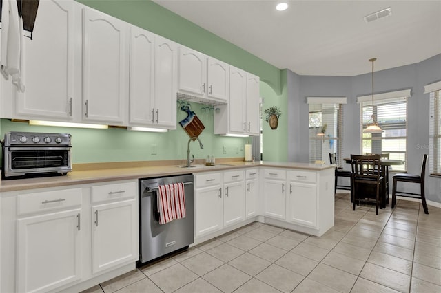 25105 Laurel Valley Rd, Leesburg, FL 34748 - kitchen featuring stainless steel dishwasher, white cabinets, a peninsula, light countertops, and recessed lighting