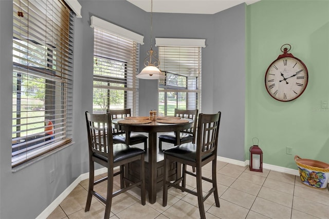 25105 Laurel Valley Rd, Leesburg, FL 34748 - dining area featuring light tile patterned flooring and baseboards
