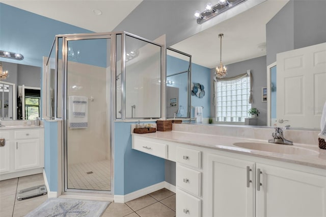 25105 Laurel Valley Rd, Leesburg, FL 34748 - full bath with a chandelier, tile patterned floors, a shower stall, vanity, and plenty of natural light