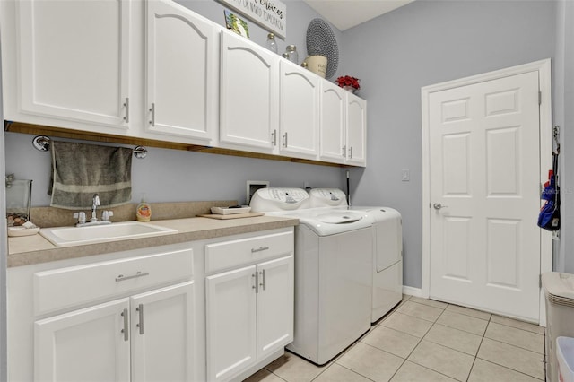 25105 Laurel Valley Rd, Leesburg, FL 34748 - washroom with washing machine and clothes dryer, cabinet space, and light tile patterned floors
